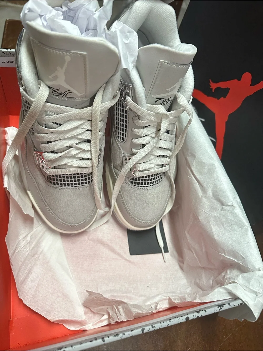 Jordan Men’s Retro 4 Sneakers in Light Grey and White